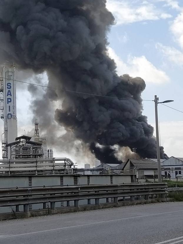 Venice - Marghera - Italy Porto Marghera, vast fire in the acetone plant. Black cloud and chemical alarm.