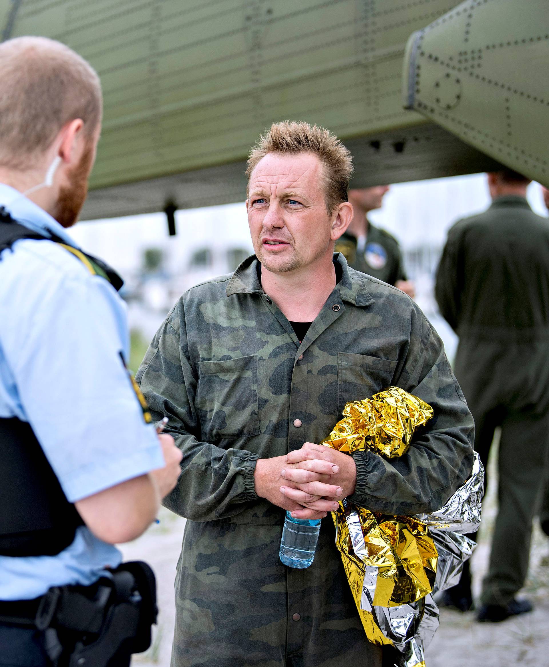 Danish submarine owner and inventor Peter Madsen lands with the help of the Danish defence in Dragor Harbor south of Copenhagen