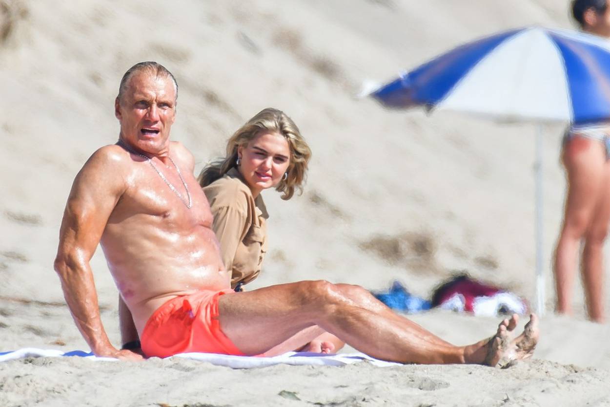 *EXCLUSIVE* Dolph Lundgren and fiancee Emma Krokdal enjoy a sunny beach day date in Malibu!