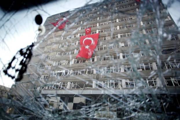 The Ankara police headquarters is seen through a car