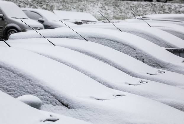 Cars covered in Snow