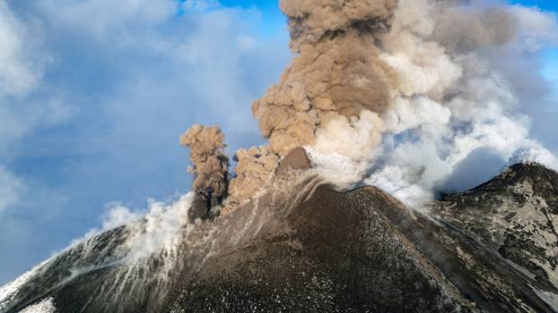 Italy's Mount Etna erupts