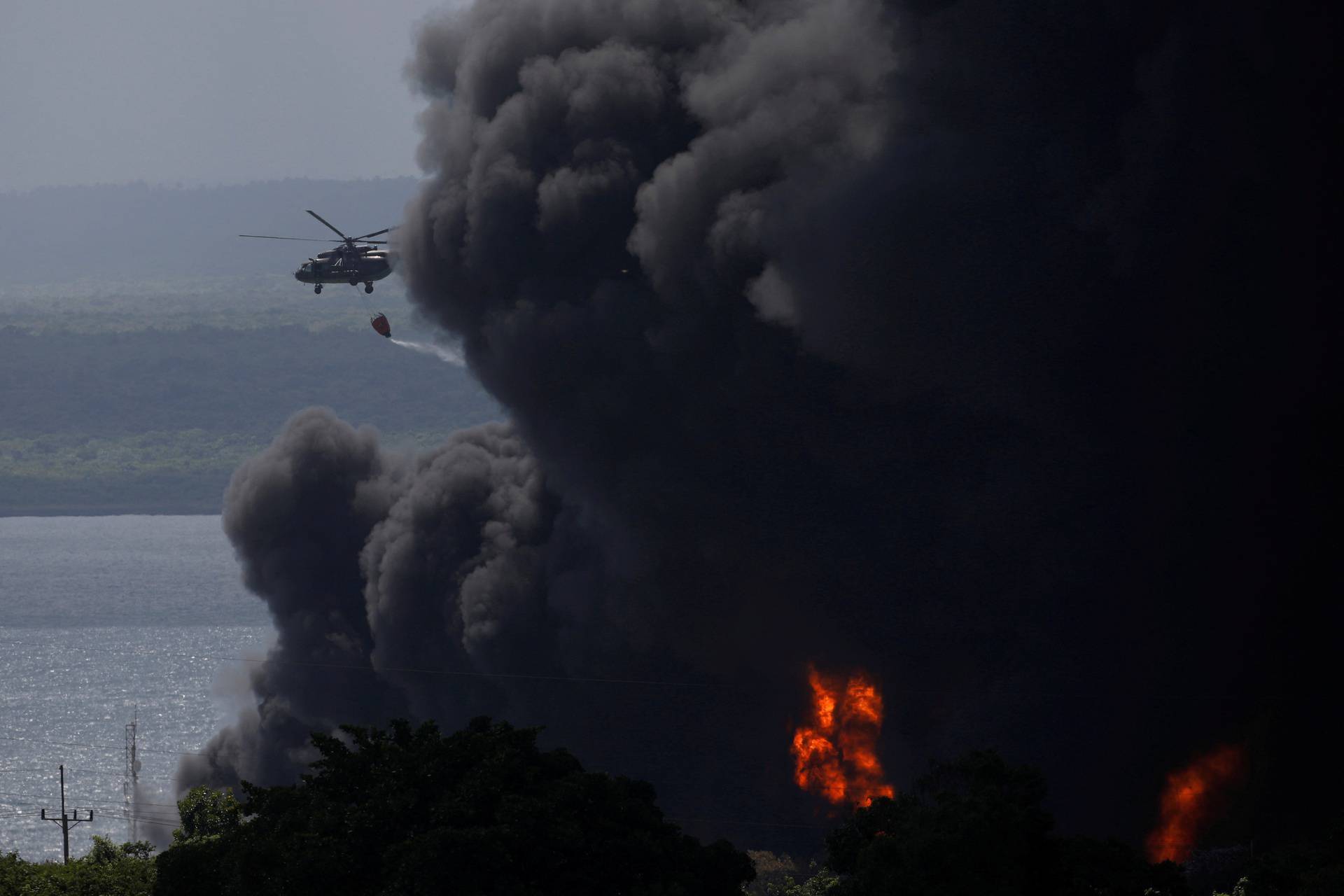 Major fire spreads at Cuban fuel storage facility hit by lightning