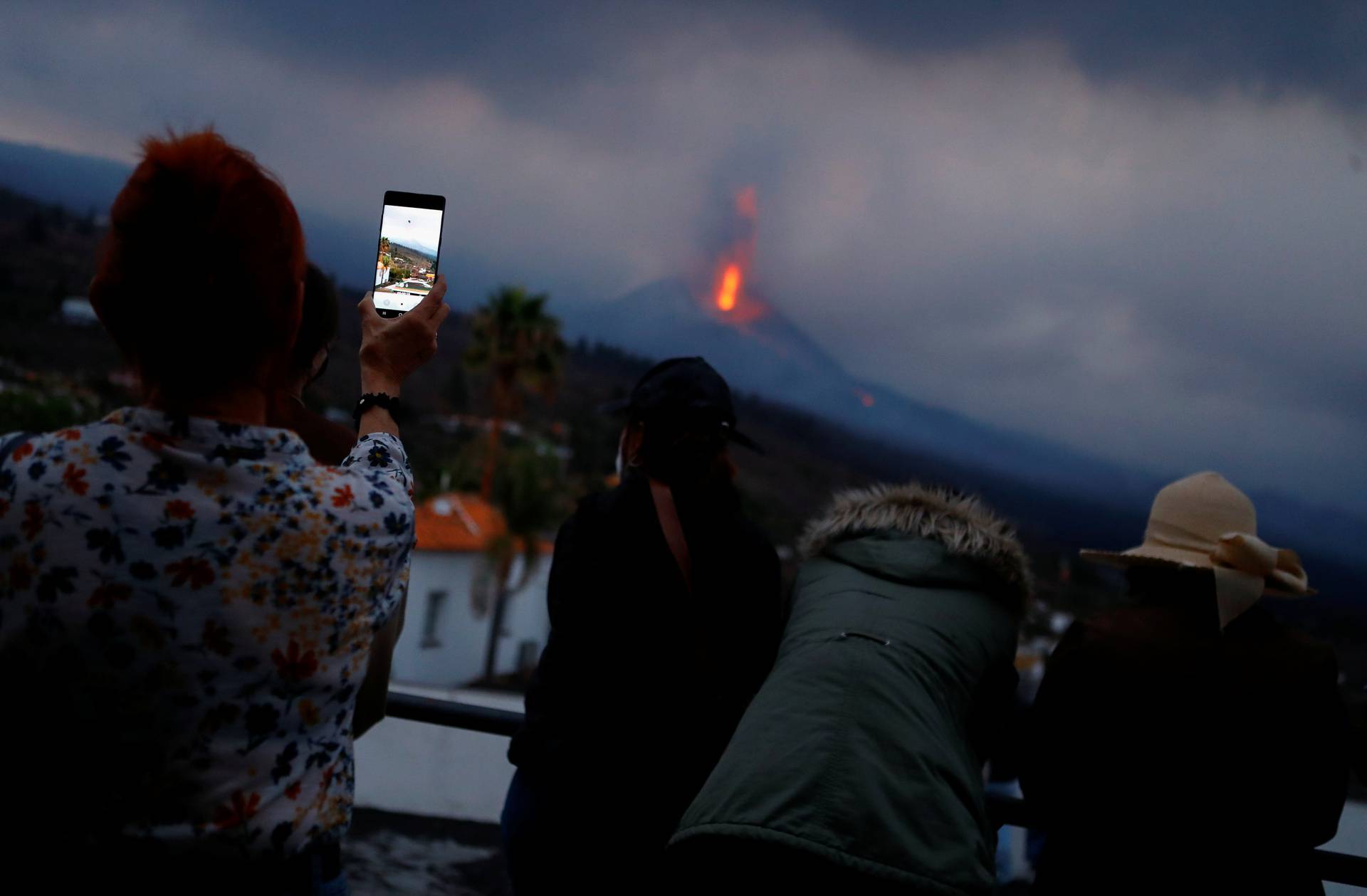 Tourists arrive at the Tajuya viewpoint to see the Cumbre Vieja volcano that continues to expel lava