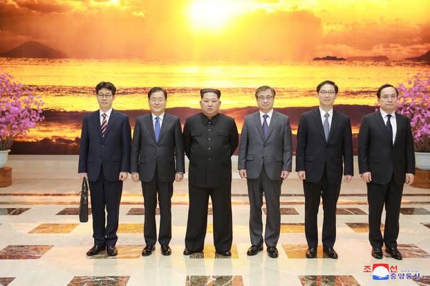 North Korean leader Kim Jong Un meets members of the special delegation of South Korea