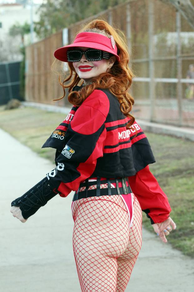 Phoebe Price in red at the park
