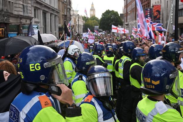 Protesters gather on the day of an anti-immigration rally organised by British anti-immigration activist Stephen Yaxley-Lennon, also known as Tommy Robinson in London