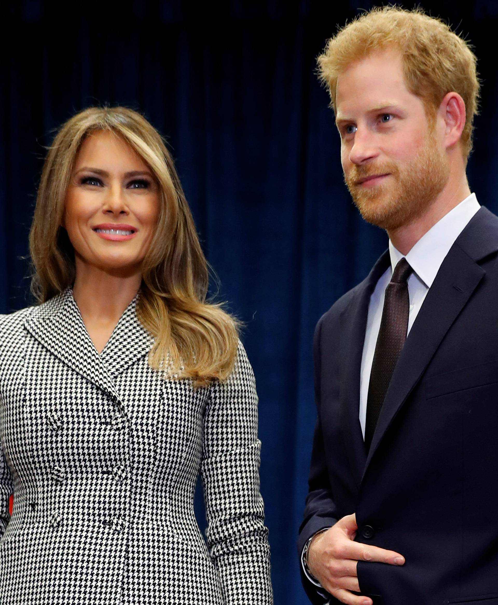 U.S. first lady Melania Trump meets with Britain's Prince Harry before attending the opening ceremony of the Invictus Games in Toronto, Canada