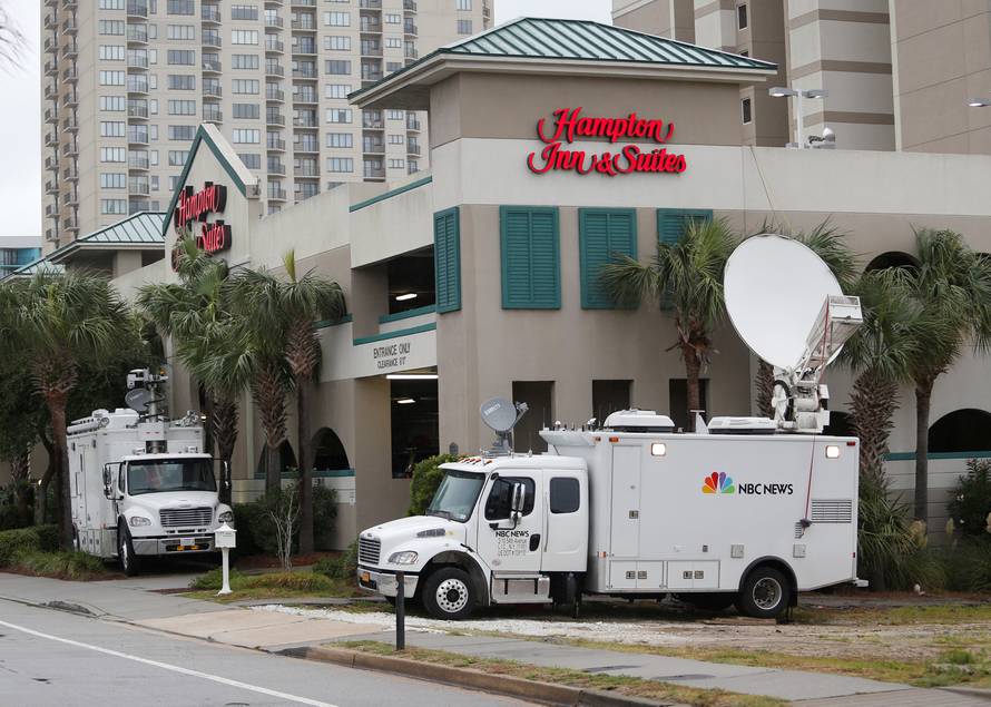 NBC satellite trucks are positioned along Ocean Boulevard during Hurricane Florence in Myrtle Beach