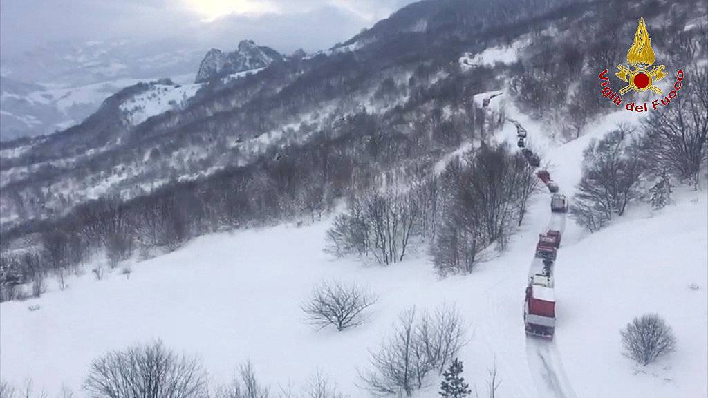 An aerial photo shows the rescuers heading to Hotel Rigopiano in Farindola, central Italy, hit by an avalanche.
