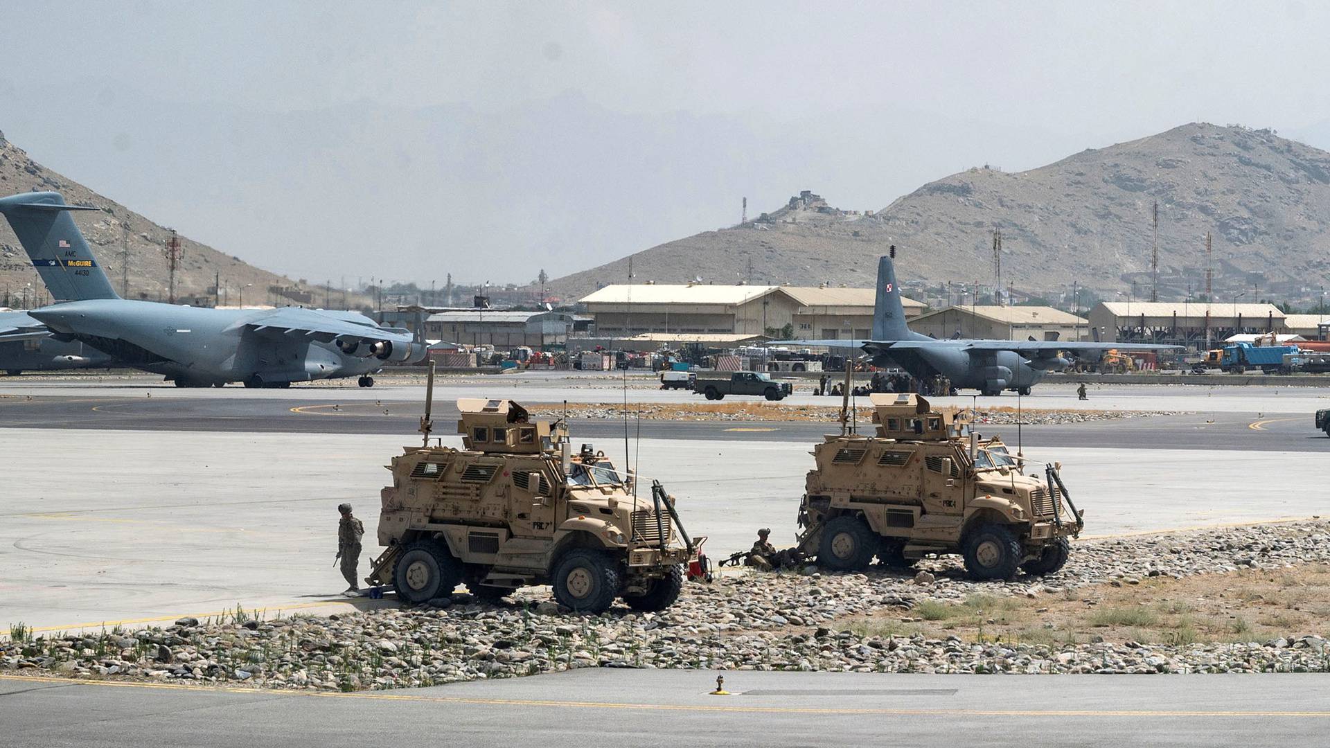 FILE PHOTO: U.S. Army soldiers assigned to the 82nd Airborne Division patrol Hamid Karzai International Airport in Kabul