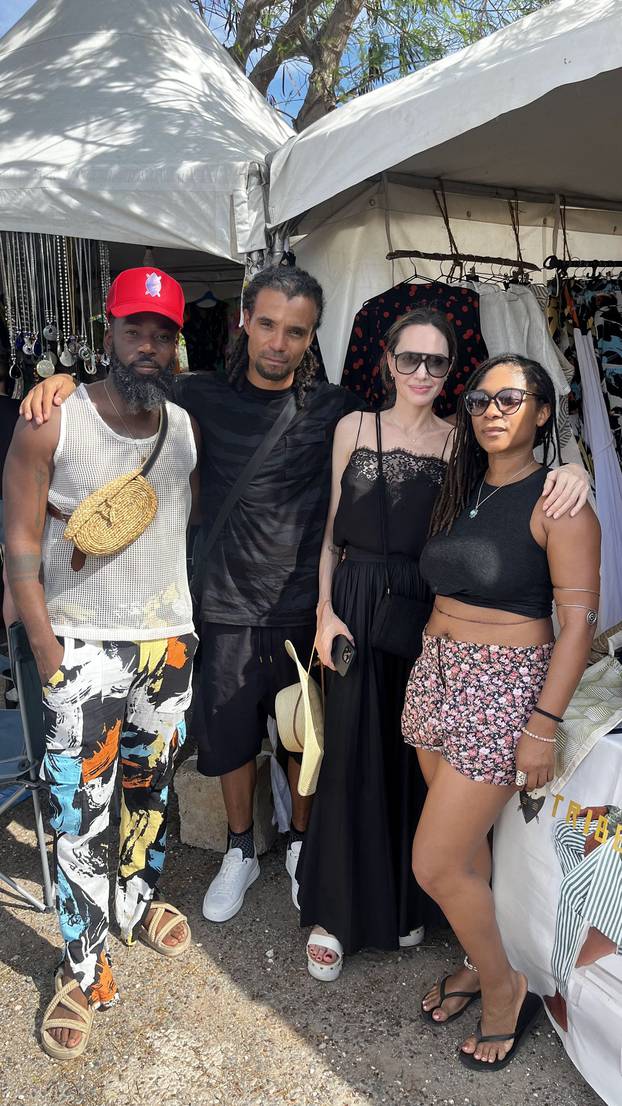 Angelina Jolie visits local fashion brand Tribe Nine Studios’ booth at the Calabash Literary Festival in Jamaica