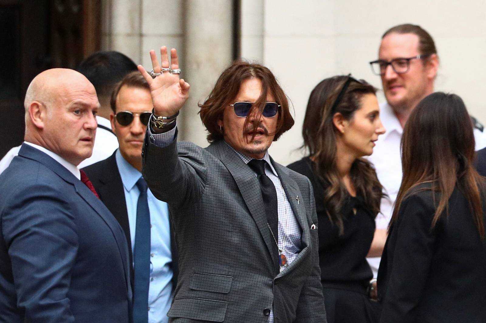 Actors Amber Heard and Johnny Depp at the High Court in London