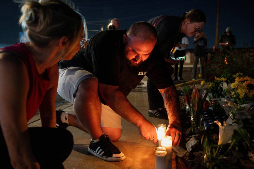 Makeshift memorial outside the mortuary where the body of slain conservative activist Charlie Kirk was delivered, in Phoenix