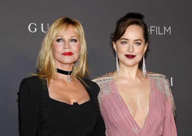 Melanie Griffith and Dakota Johnson at the 2017 LACMA Art + Film Gala held at the LACMA in Los Angeles, USA on November 4, 2017.