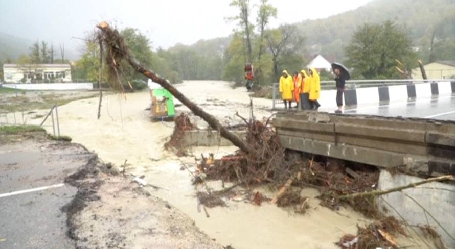 A still image shows a bridge damaged by floodwaters in Krasnodar Region