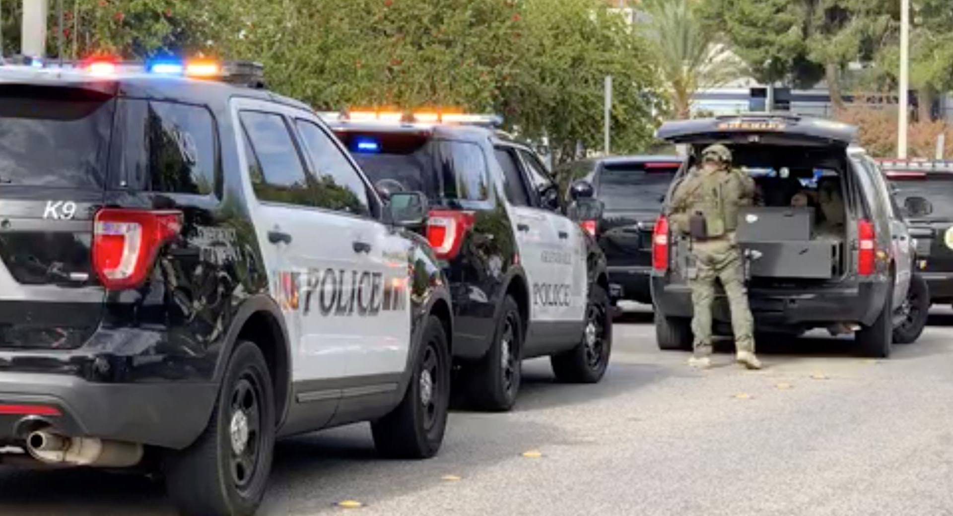 Sheriff puts on tactical gear after a shooting at Saugus High School in Santa Clarita, California