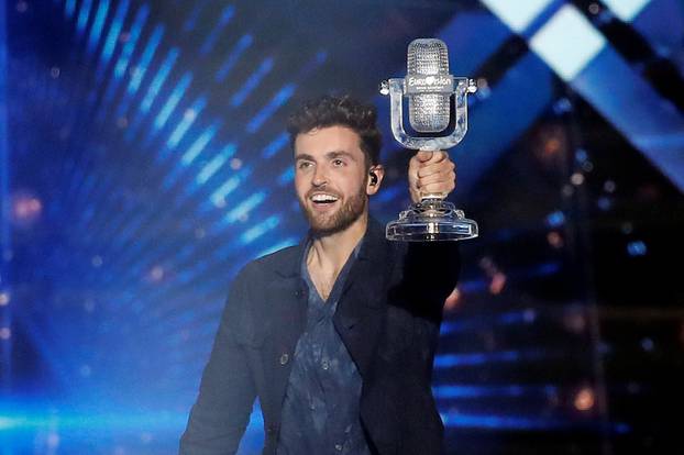 Participant Duncan Laurence of the Netherlands holds up the trophy after winning the 2019 Eurovision Song Contest in Tel Aviv, Israel