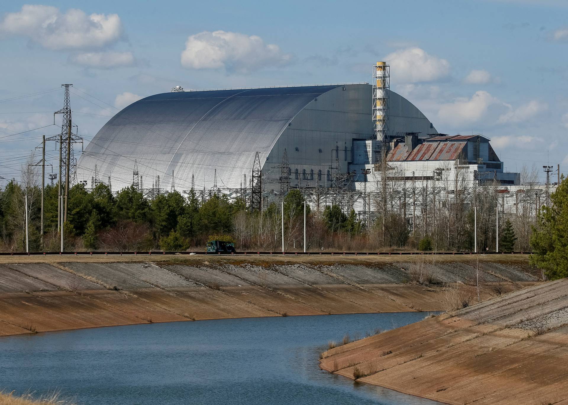 General view of the New Safe Confinement structure over the old sarcophagus covering the damaged fourth reactor at the Chernobyl Nuclear Power Plant, in Chernobyl