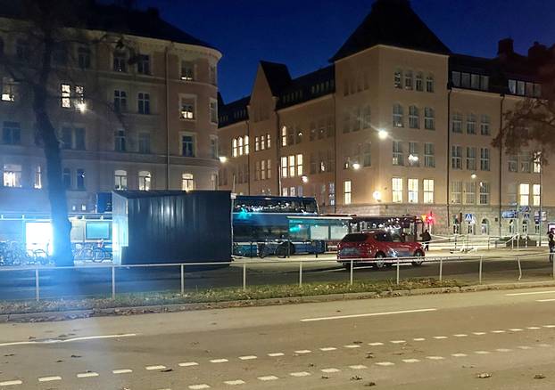 A view of the site where a bus hit a bus stop in central Stockholm