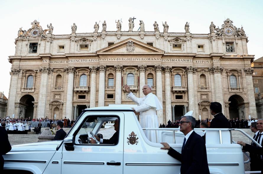 Pope Leo XIV greets the faithful ahead of a Holy Mass presided over by Metropolitan Archbishop of Zagreb Drazen Kutlesa, at the Vatican