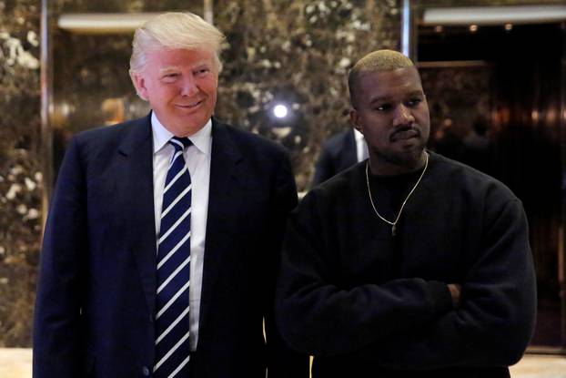 U.S. President-elect Donald Trump and musician Kanye West pose for media at Trump Tower in Manhattan, New York City