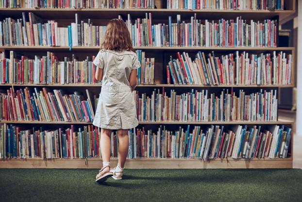 Schoolgirl,Choosing,Book,In,School,Library.,Smart,Girl,Selecting,Literature