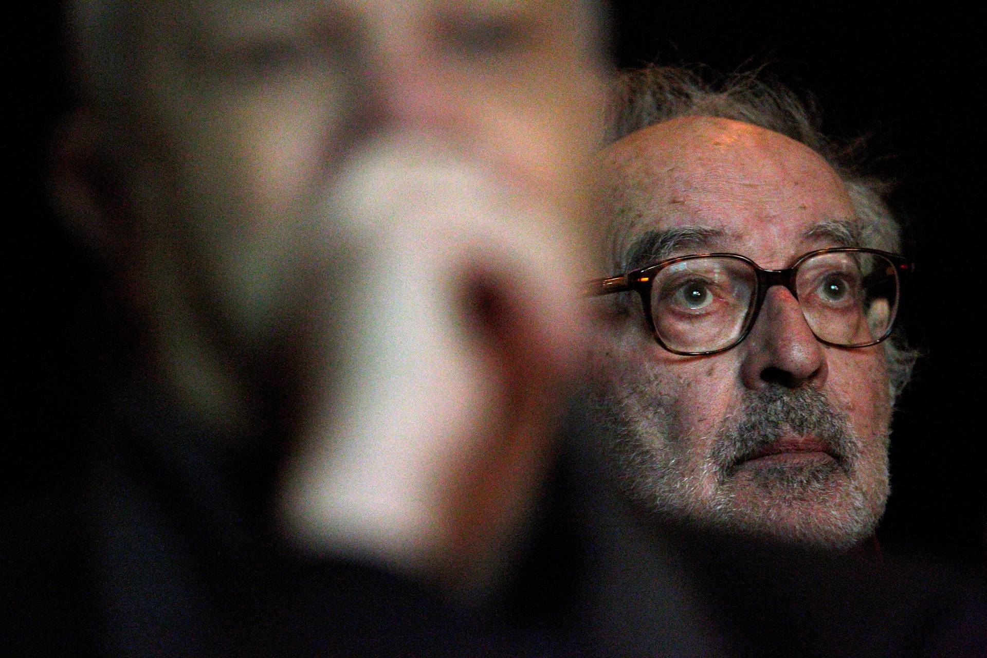 FILE PHOTO: French-Swiss film director Godard attends the 2010 Swiss Federal 'Grand Prix Design' award ceremony in Zurich