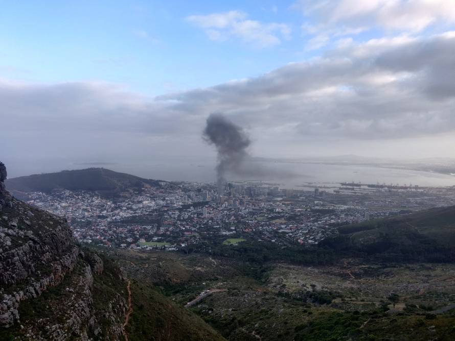Smoke rises from a burning building in Cape Town