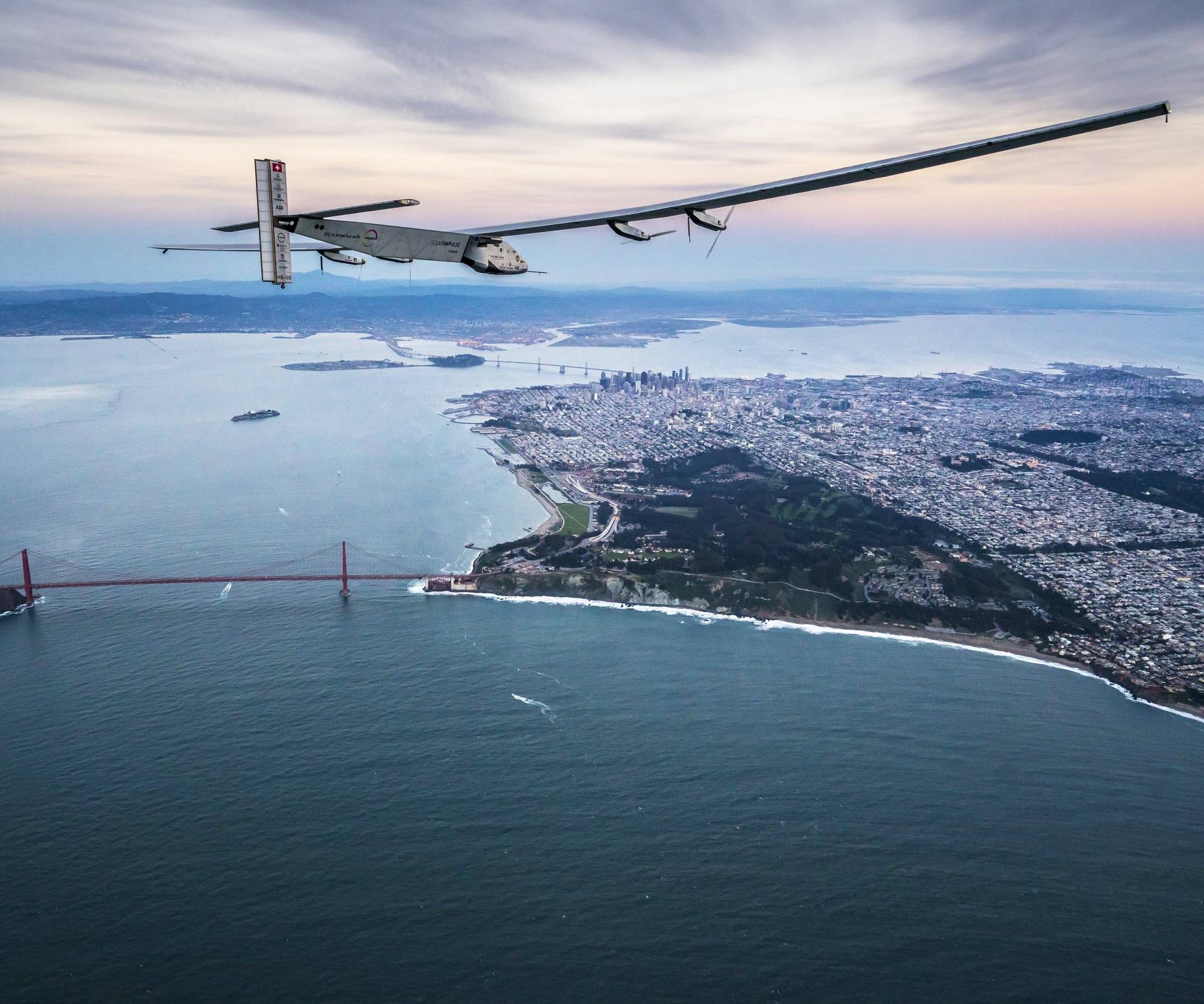 "Solar Impulse 2", a solar-powered plane piloted by Bertrand Piccard of Switzerland, flies over the Golden Gate bridge in San Francisco