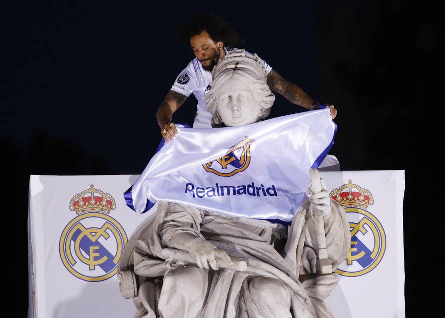 Real Madrid celebrate winning the Champions League Final with an open top bus parade