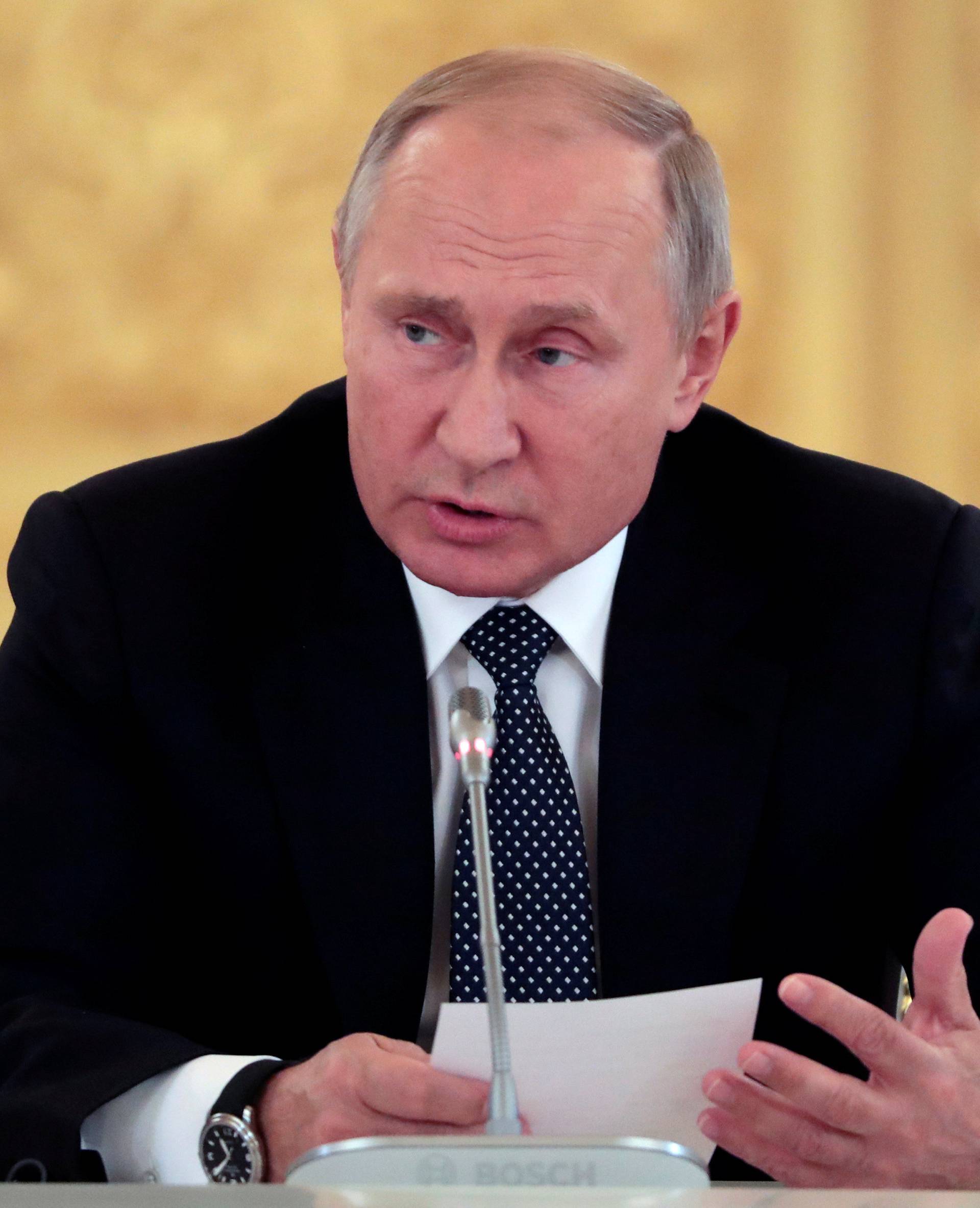 Russian President Putin speaks during a meeting with Italian businessmen in Moscow