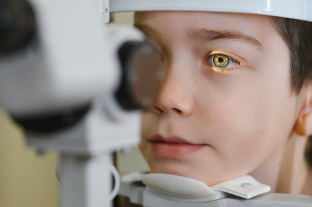 Close-up,Of,A,Boy,Undergoing,A,Vision,Check,Using,A