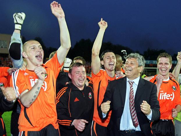 FILE PHOTO: Shakhtar Donetsk players celebrate victory against Dynamo Kiev Kriviy Rih