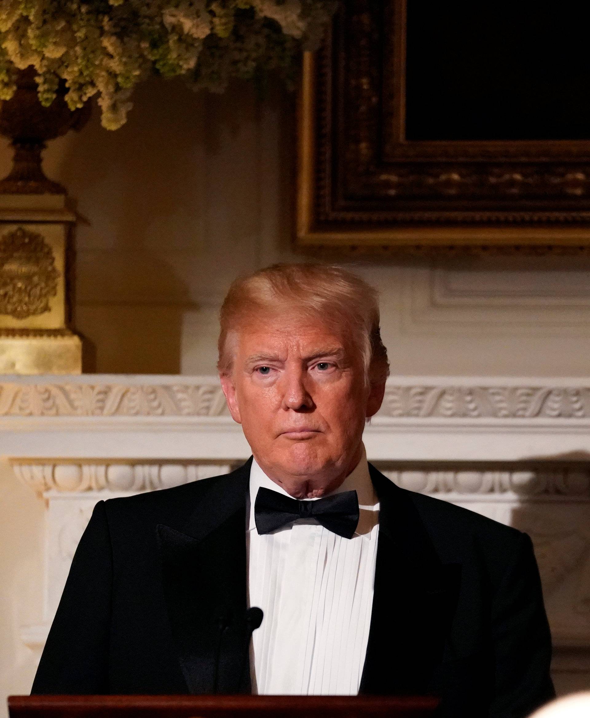 U.S. President Donald Trump toasts French President Emmanuel Macron during a State Dinner at the White House in Washington, U.S.