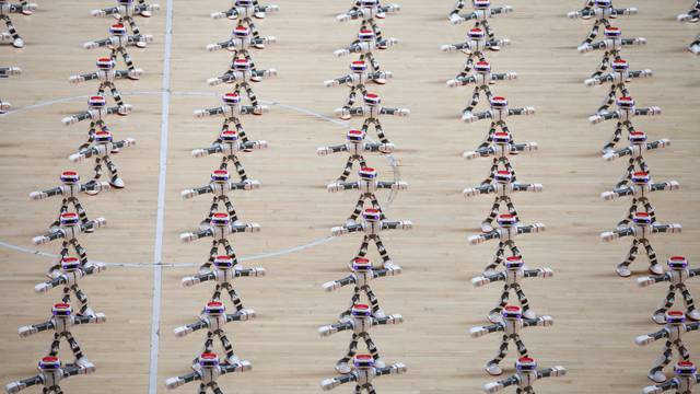 Robots perform dancing during a robot contest in Dezhou