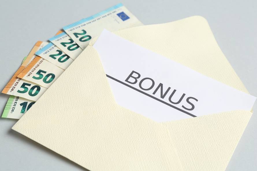 Envelope,With,Money,And,Word,Bonus,On,Light,Grey,Background,