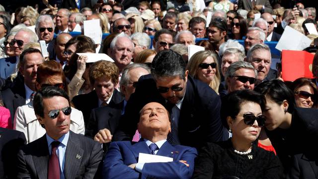 FILE PHOTO: Former Italian Prime Minister Silvio Berlusconi is pictured as a translator repeats remarks by former U.S. president George W. Bush at the dedication ceremony of the George W. Bush Presidential Center in Dallas