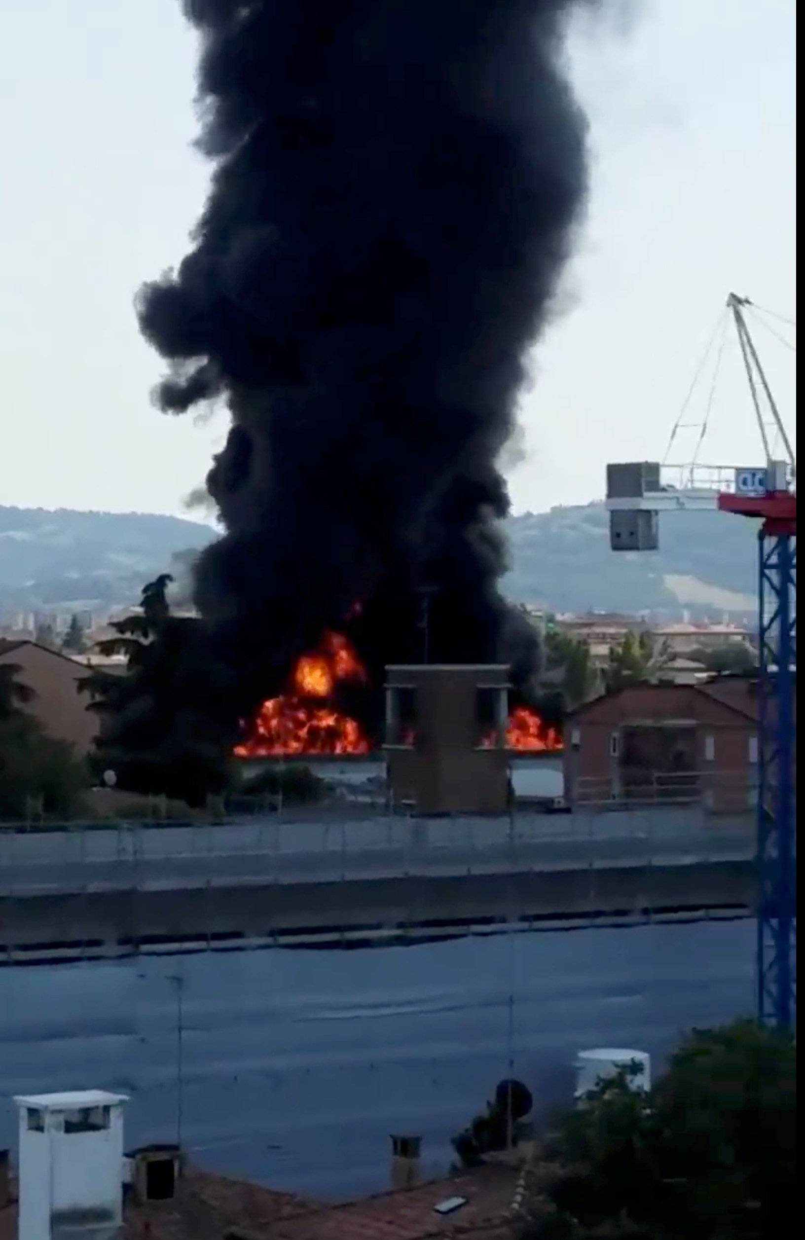 A fire is seen after an accident caused a large explosion at Borgo Panigale, on the outskirts of Bologna