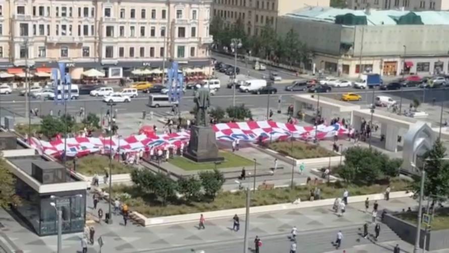 A giant Croatia flag with the inscription "Thank you, Russia" in Russian is seen at Triumfalnaya Square in Moscow