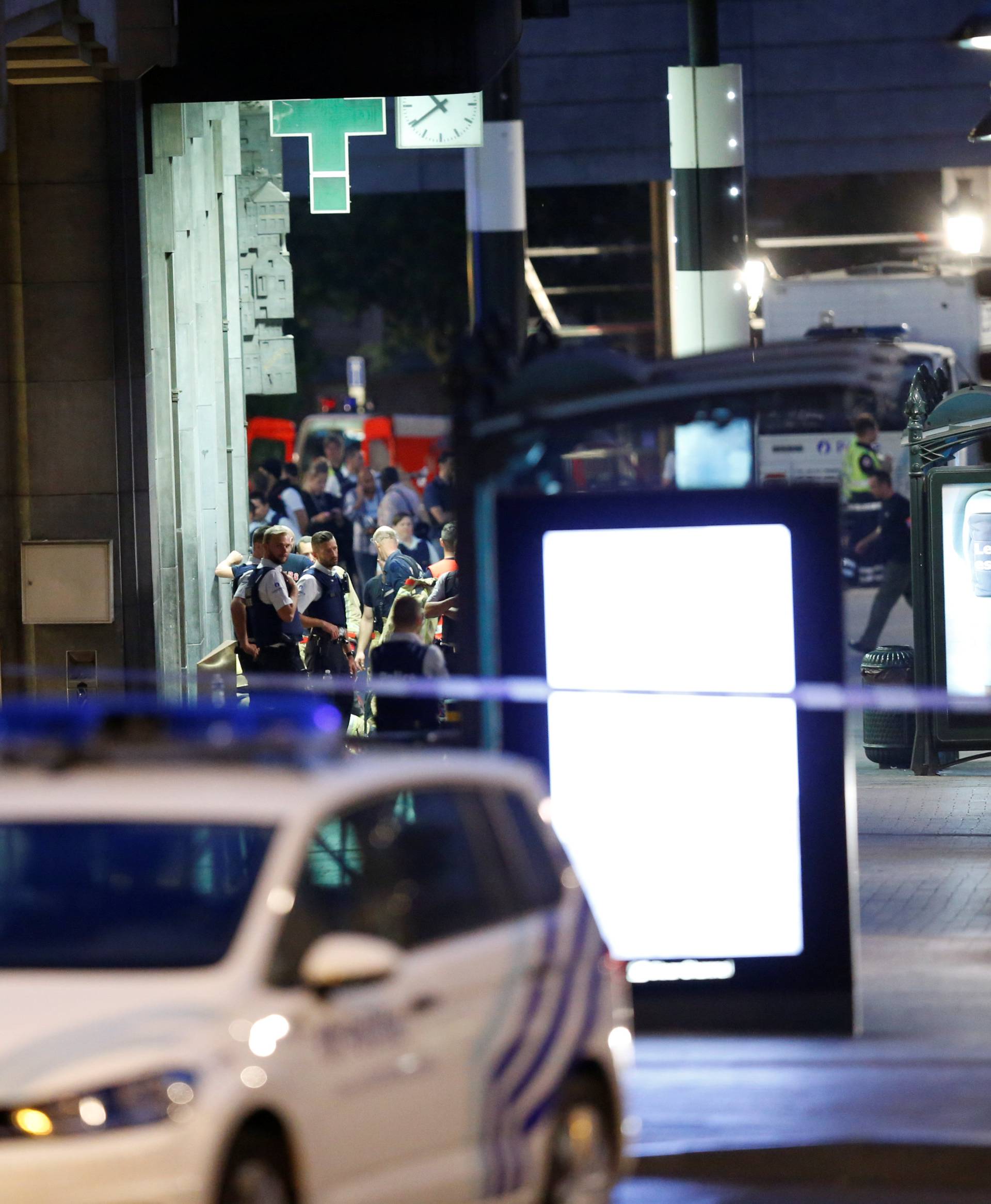 Security forces take up position following an explosion at the Central Station in Brussels.
