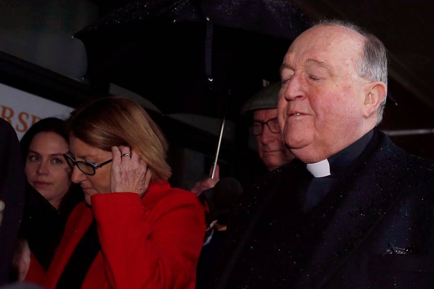 Archbishop Philip Wilson arrives at Newcastle Local Court, in Newcastle