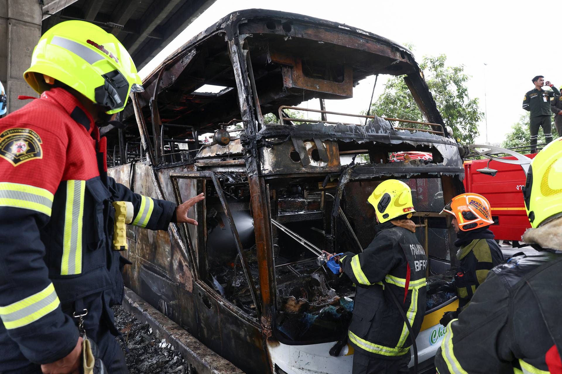 Rescue efforts after bus burns carrying teachers and students on outskirts of Bangkok