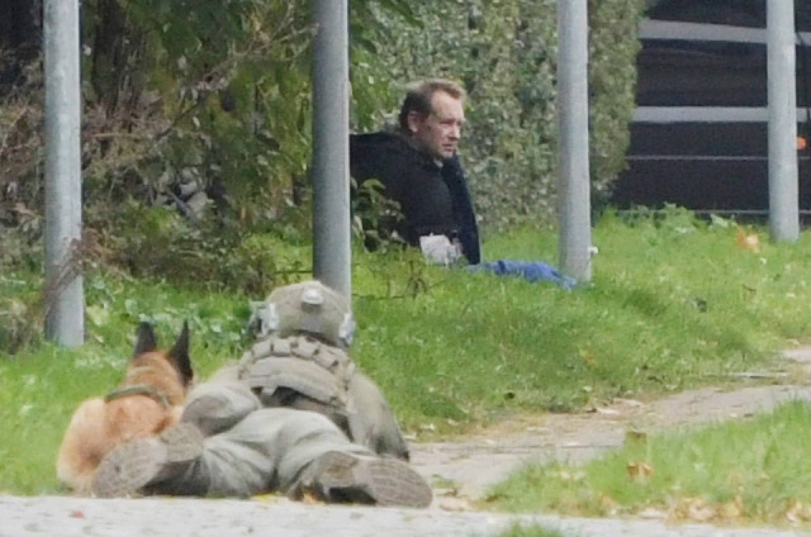 Peter Madsen is seen surrounded by police in Albertslund