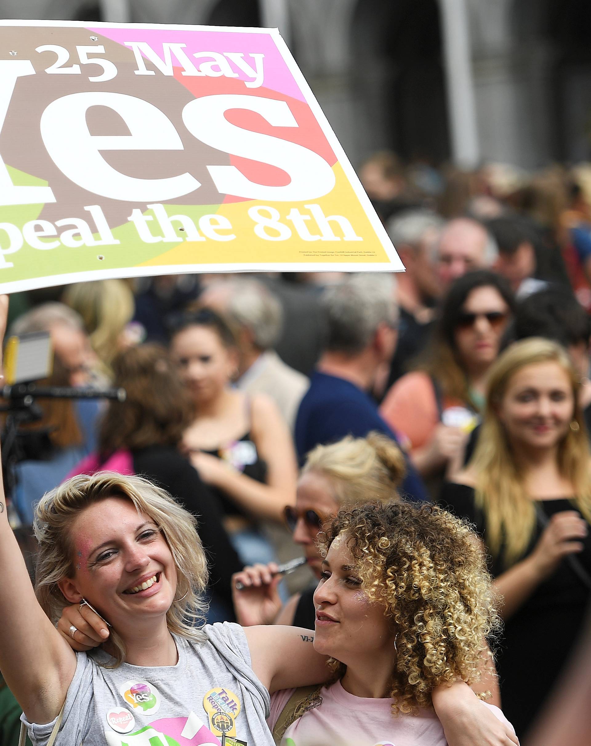 Women celebrate the result of yesterday's referendum on liberalizing abortion law, in Dublin