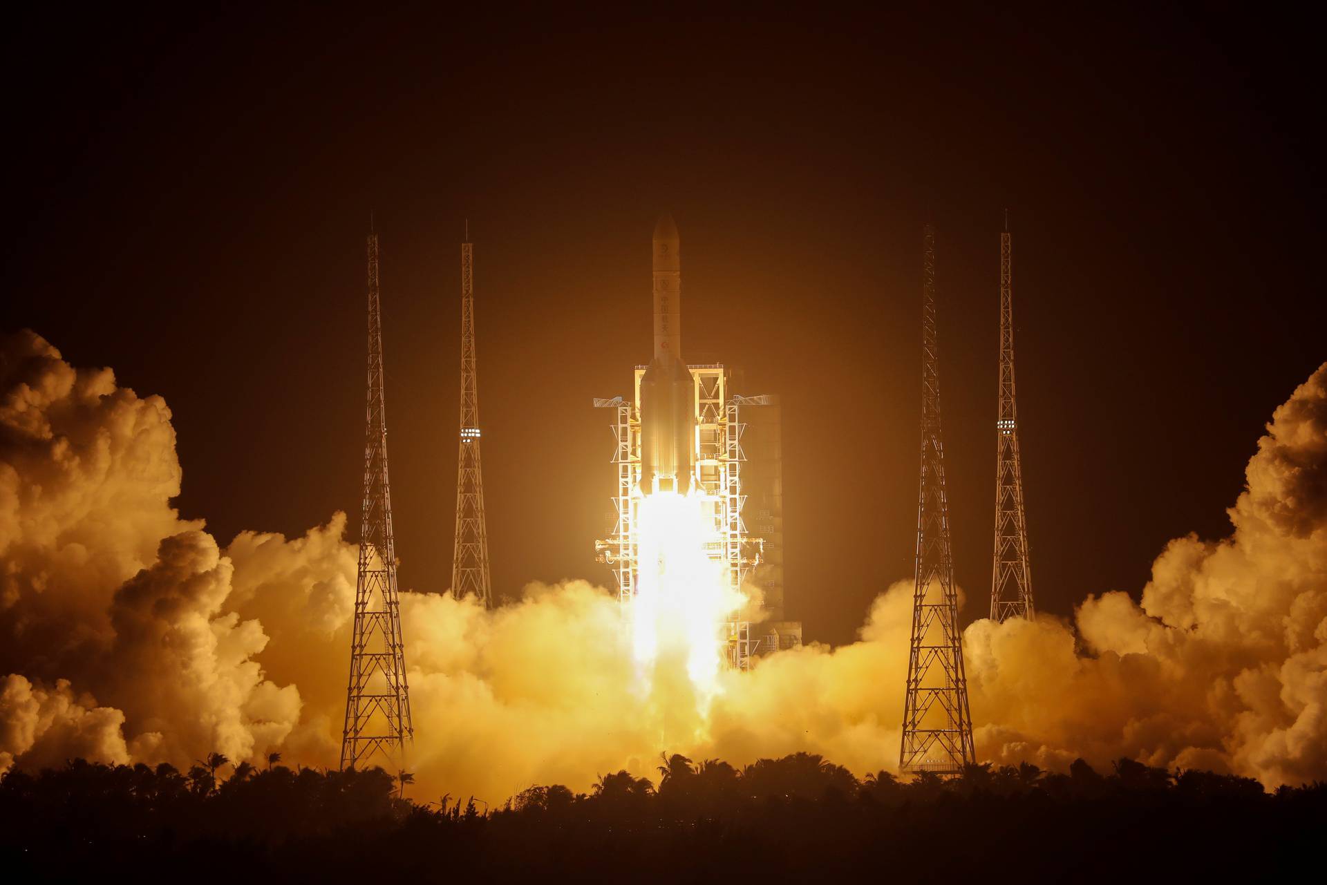 The Long March-5 Y5 rocket, carrying the Chang'e-5 lunar probe, takes off from Wenchang Space Launch Center, in Wenchang