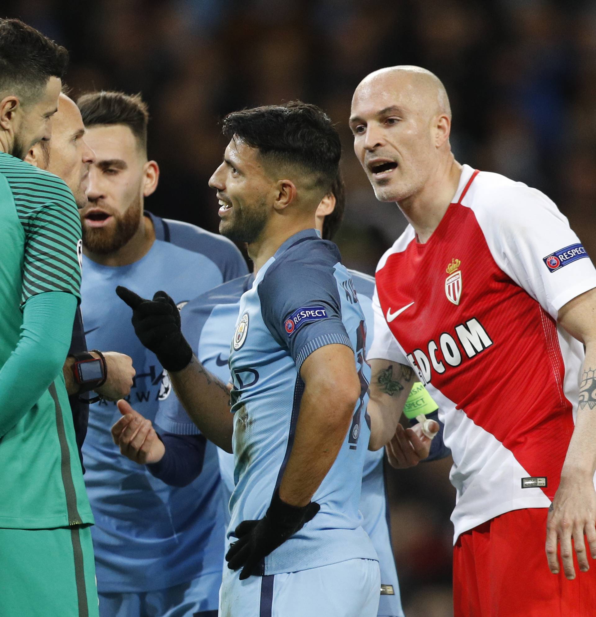 Manchester City's Sergio Aguero with referee Antonio Mateu Lahoz and Monaco's Danijel Subasic