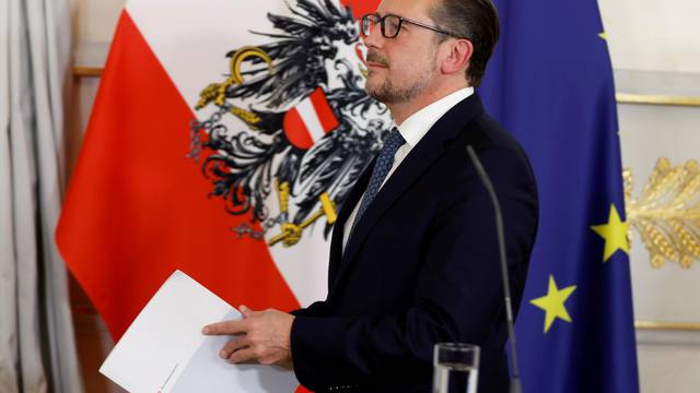 FILE PHOTO: Austrian Chancellor Schallenberg arrives to a news conference, in Vienna
