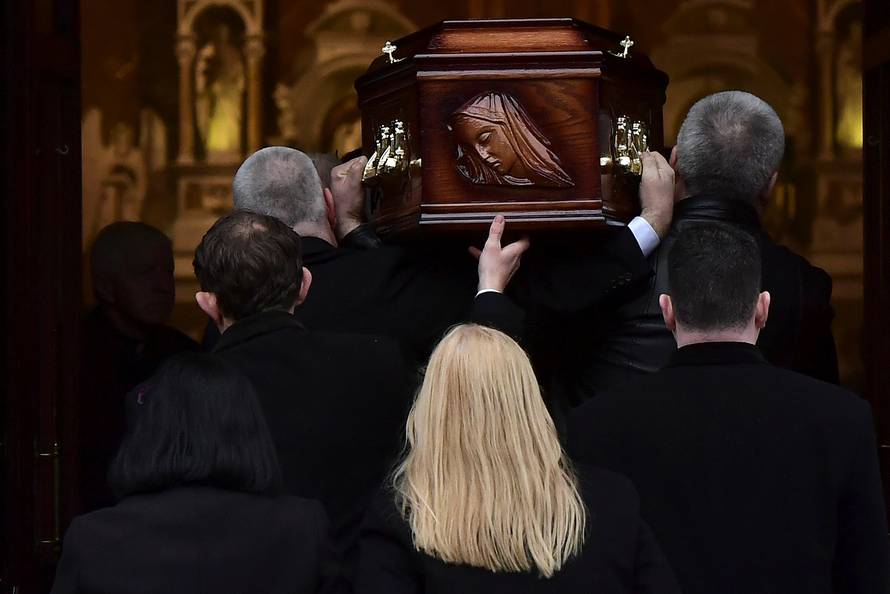 The mother of Cranberries singer Dolores O'Riordan, Eileen O'Riordan follows her daughter's coffin into St. Joseph's Church for a public reposal in Limerick