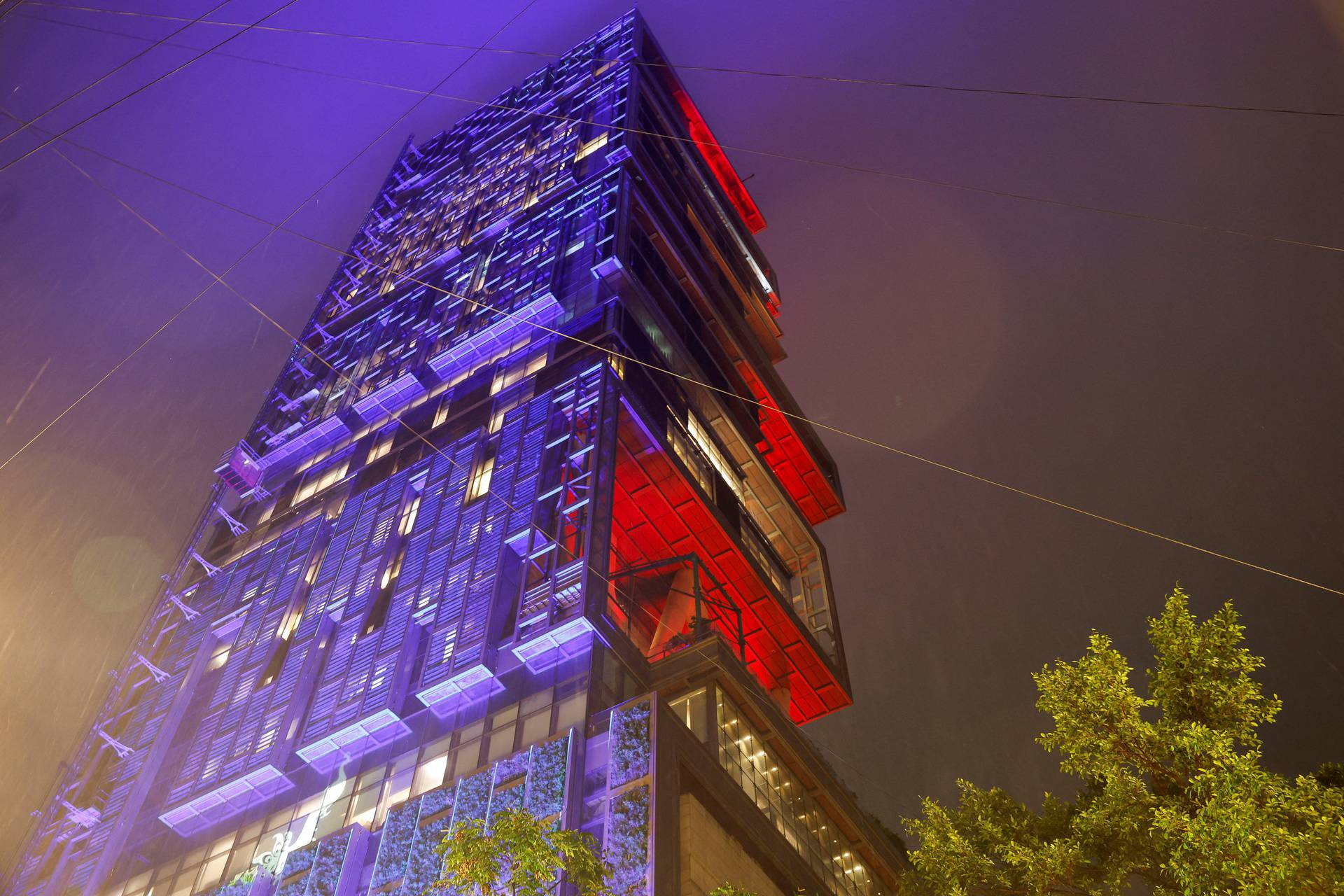 Coloured lights are seen outside the home of businessman Mukesh Ambani ahead of his son Anant Ambani's wedding to Radhika Merchant in Mumbai